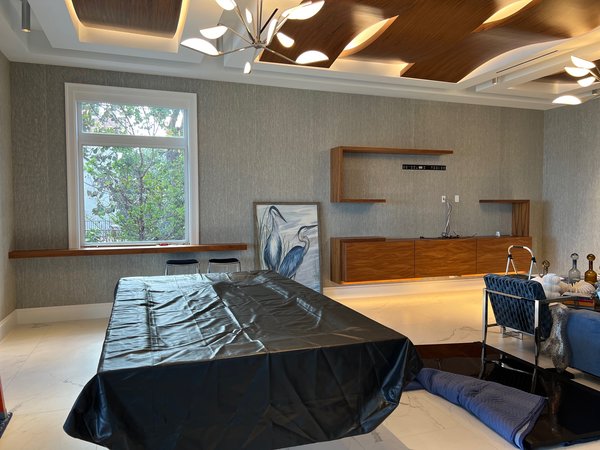 Professional grassweave wallpaper installation in luxury South Florida home